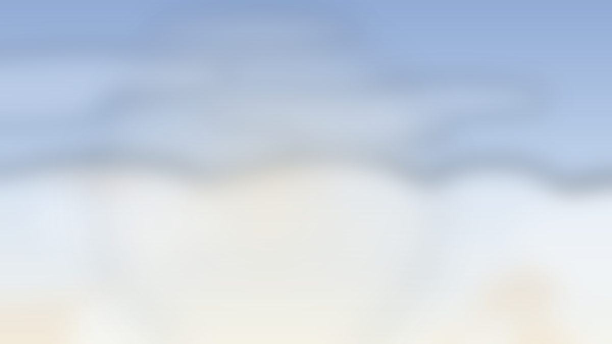 A calm morning sky in blue and cream